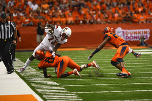 Antwan Cordy, Syracuse's starting safety, is shown here making a tackle against Louisville last year. Cordy has received praise this week from both Babers and Franklin. 