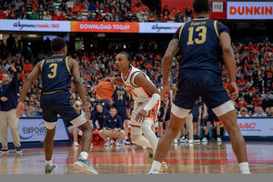 Our beat writers are split on if Syracuse will defeat Virginia Tech Tuesday in SU's final home game of the season.