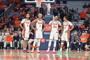 Our beat writers predict Syracuse will defeat Louisville for a second straight time. 